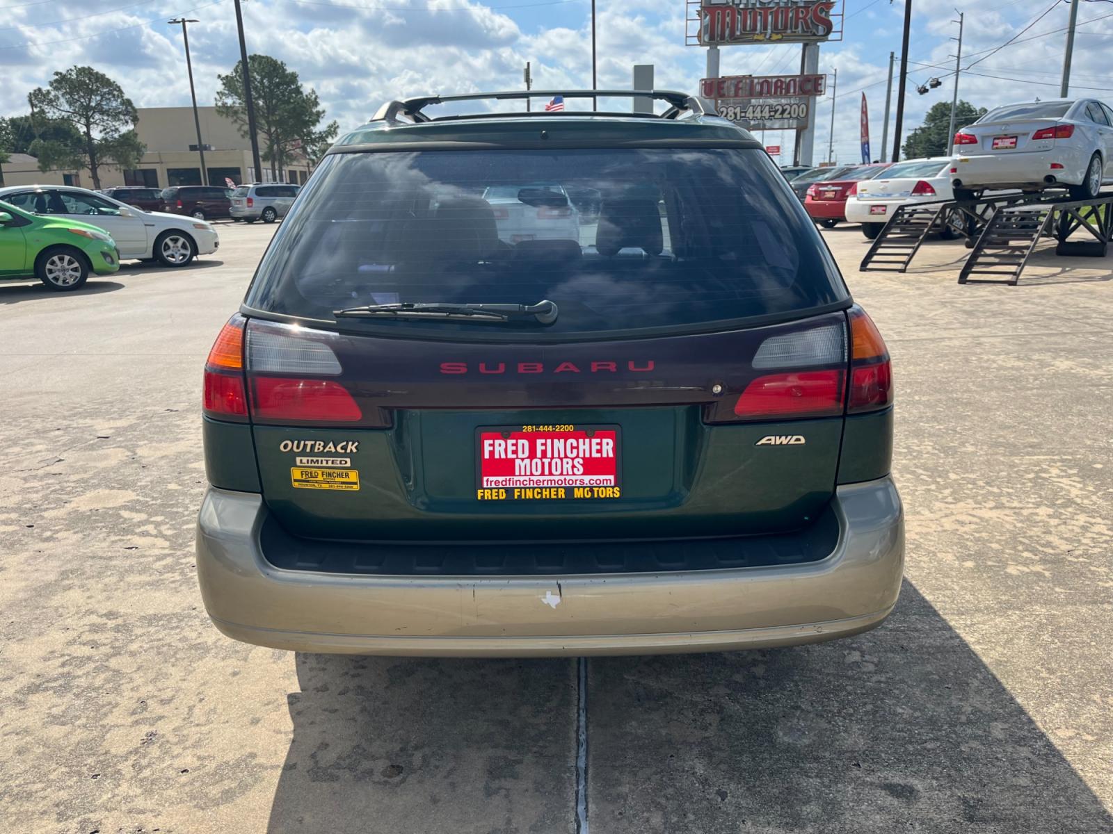 2003 green /TAN Subaru Outback Limited Wagon (4S3BH686737) with an 2.5L H4 SOHC 16V engine, 5-Speed Manual Overdrive transmission, located at 14700 Tomball Parkway 249, Houston, TX, 77086, (281) 444-2200, 29.928619, -95.504074 - Photo #5